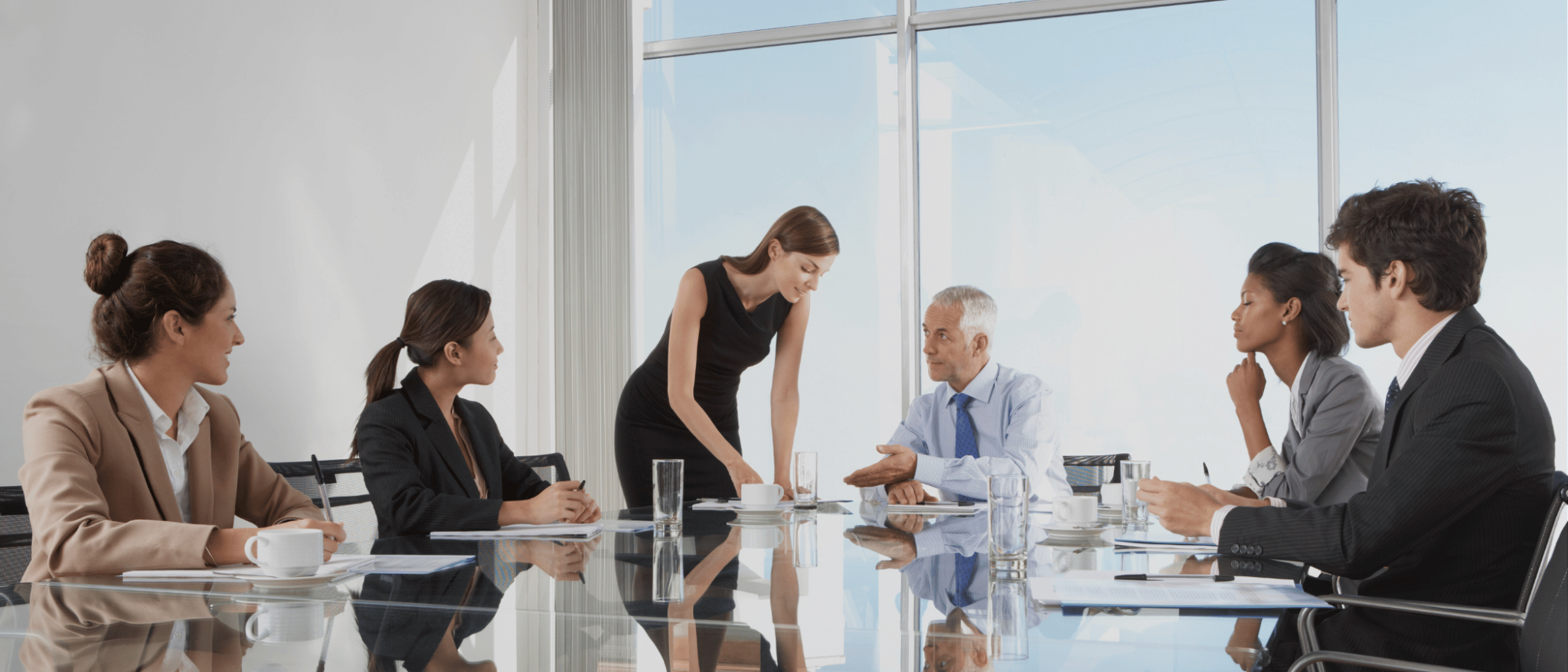 Six fellow board members gather to discuss the company's financial results with The Entrepreneur CPA.