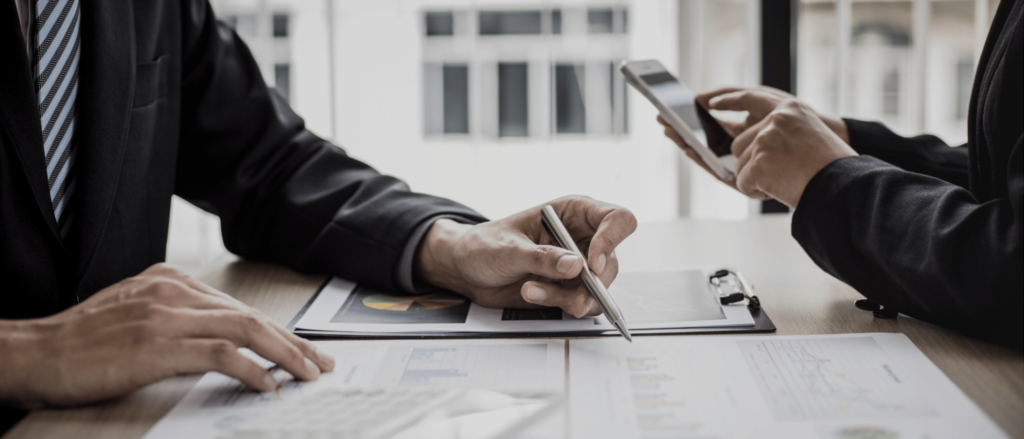 Professional Services Supporting Entrepreneurs by The Entrepreneurial CPA with a client to discuss their financial results.
