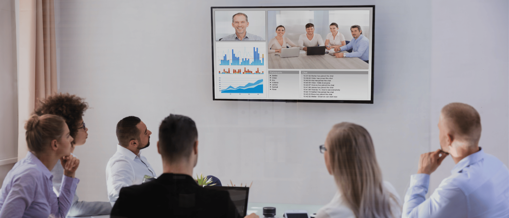 The remote Board meeting with today's technology is an available option to connect locations around the world. This office displays an in-house team speak through a video conference with other members in another location.